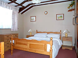 Stable bedroom with double bed