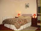 An ensuite with double bed and single bed. Complete with remote TV/text, clock radio alarm, hospitality tray and country views.