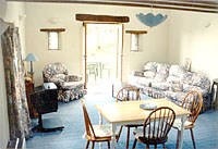 Access to the secluded garden and patio from the lounge